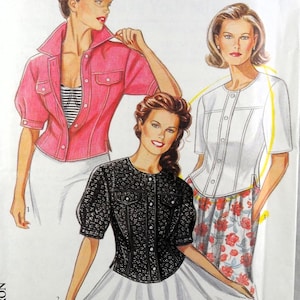 May include: A sewing pattern envelope featuring illustrations of three short-sleeved jackets. One is pink with a collar, one is black with a textured pattern, and one is white. The text includes "NUMBER 81", "PATRON", "PATTERN", and "1992".