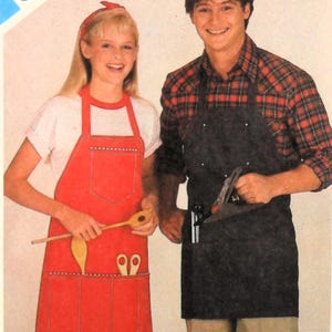 May include: A vintage image featuring two people wearing aprons. One person wears a red apron with pockets holding a wooden spoon and scissors. The other person wears a black apron and holds a tool. The aprons are part of a sewing pattern.