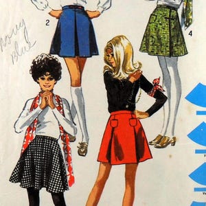 May include: A handmade wooden sign with the text "Welcome" in a playful font. The sign is painted white with a distressed finish, and features a small, decorative heart. Dimensions are approximately 12 inches wide and 6 inches tall.