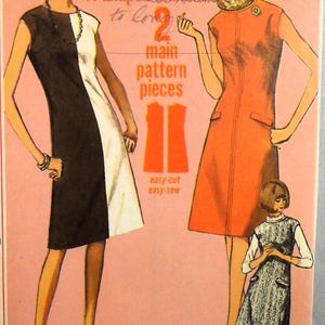 May include: A vintage sewing pattern for a dress with two different styles. The pattern is called "Jiffy" and features a black and white dress and a red dress. The pattern includes instructions for making the dress and is labeled "easy-cut, easy-sew".