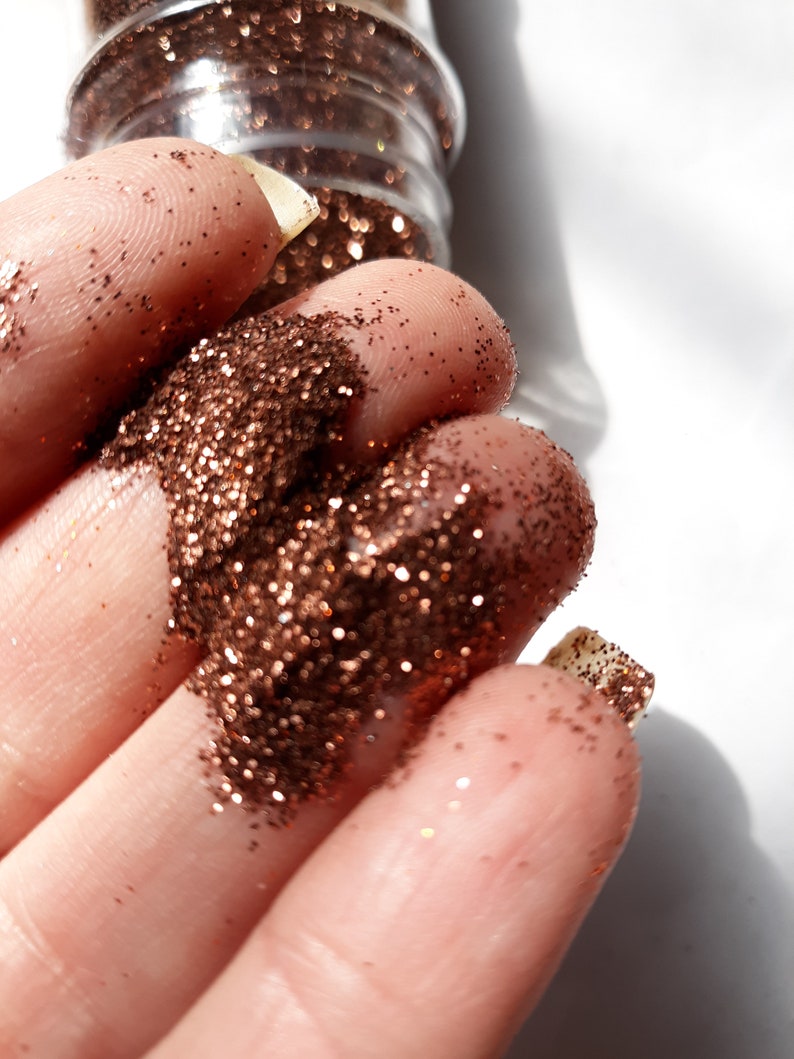 Bronze 196 fine Polyester glitter 2 oz in a shaker bottle