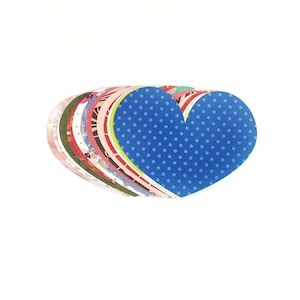 15 paper heart cutouts, heart shapes, heart die cuts, different colors and designs. Hearts. 3.5 x 2.5 inches