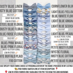May include: A collection of pre-tied bow ties and hairbows in various shades of blue, with floral and patterned designs. The image includes text labels indicating fabric types such as linen, cotton, and satin. The text also indicates which items are low in stock or sold out.