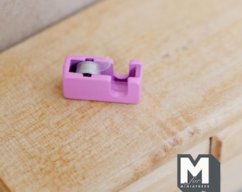 Dollhouse Supplies miniature metal tape dispenser with a small roll of real tape 1:12 scale (pink) - G065