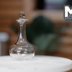 1:12 poppenhuisbenodigdheden miniatuur kleine doorzichtige glazen fles met deksel (A5)
