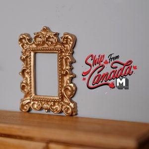 May include: A gold ornate picture frame with a decorative design. The frame is empty and ready for a photo or artwork.  Ship from Canada.