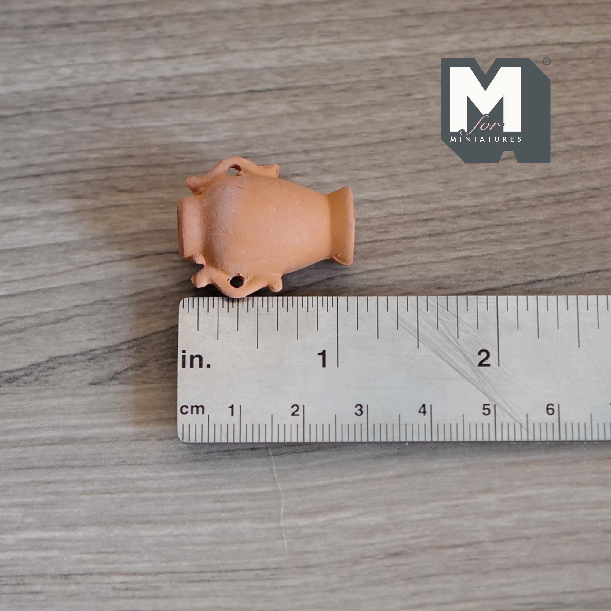 Recuperare dei vasi in terracotta per creare fantastiche decorazioni