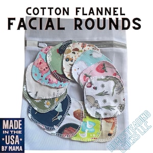 May include: A selection of cotton flannel facial rounds with diverse patterns, such as pigs, strawberries, and mushrooms, are displayed in a white mesh bag. The text "COTTON FLANNEL FACIAL ROUNDS" is at the top. The words "MADE IN THE USA BY MAMA" are in the lower left.