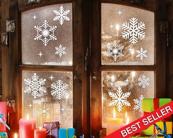 May include: A rustic wooden window with frosted glass panes decorated with white snowflake decals. The window is lit from inside with warm candlelight. A pile of wrapped gifts sits in front of the window, with a red banner reading "BEST SELLER" across the bottom.