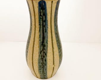 Vintage hand thrown pottery vase with striped blue, brown and gray glaze