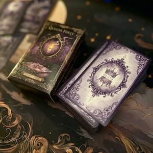 May include: A Queens Folly tarot deck featuring a rectangular box with a purple candle illustration and a stack of cards displaying a purple ornate frame with a crown graphic. The design includes dark purple and black tones with intricate scrollwork.