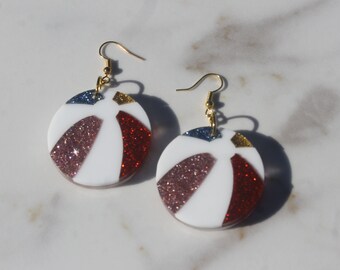 Glitter acrylic beach ball dangle earrings with gold hardware