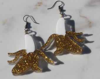 Glitter acrylic banana dangle earrings with bronze hardware