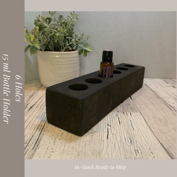 Essential Oil Bottle Holder for 15ml Bottles. Holds 6 Holes, stained charcoal, and natural beeswax finish. Sku: 375