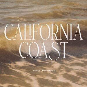 May include: A close-up of a wave crashing on a beach with the text "CALIFORNIA COAST" in white sans-serif font. The text is centered on the image and is below the wave. The text "MADE BY SANSANDSONS" is in smaller white sans-serif font below the main text.