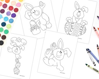 May include: Four black and white colouring pages featuring Easter bunnies. The bunnies are holding baskets, sitting on eggs, and balancing eggs. The pages are surrounded by a set of watercolour paints and crayons.