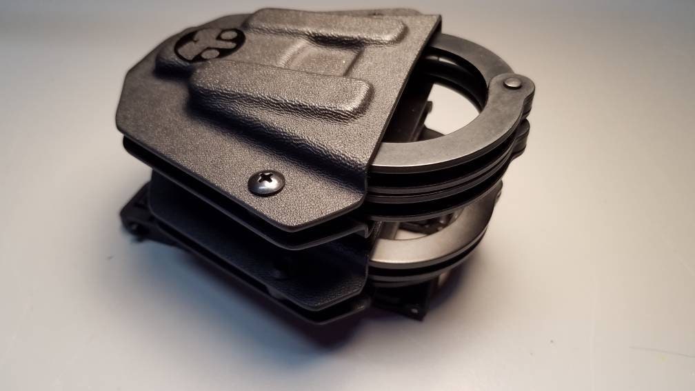 Peerless Chained Double Cuff Holder