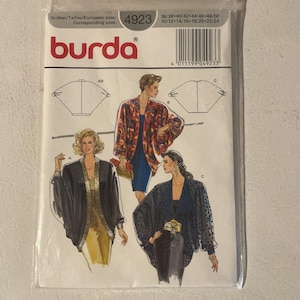May include: A Burda sewing pattern packet showing illustrations of women's jackets. The packet is sealed in clear plastic and includes size information and the Burda logo. The illustrations depict various jacket styles with different designs and colours.