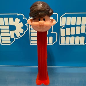 Vintage Original PEZ Boy with hair PEZ Dispenser with extra holes in head Rare!