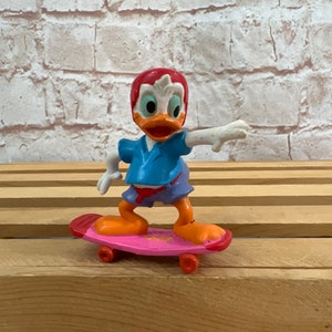 Vintage 1988 Donald Duck on a skateboard Disney Miniature PVC Mini Figure Toy by applause