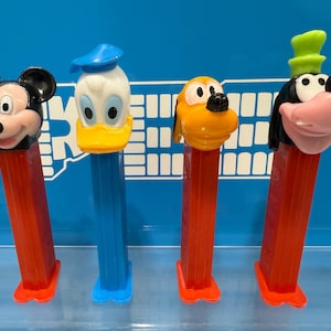 Vintage Set of 4 Disney Mickey Mouse PEZ Dispensers Lot donald duck Pluto Goofy with removable teeth