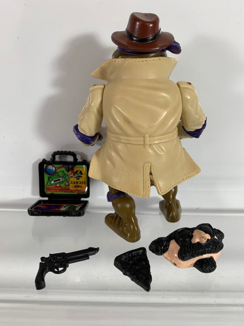 Vintage 1990 Don the undercover turtle agent Donatello TMNT Teenage Mutant Ninja Turtles action figure with mask and weapons