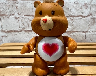 Figura miniatura de PVC de 8,9 cm (3,5 pulgadas) de la colección Care Bears, modelo vintage de 1983, fabricada por Kenner.