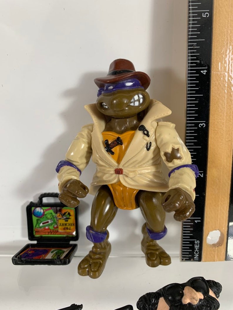 Vintage 1990 Don the undercover turtle agent Donatello TMNT Teenage Mutant Ninja Turtles action figure with mask and weapons