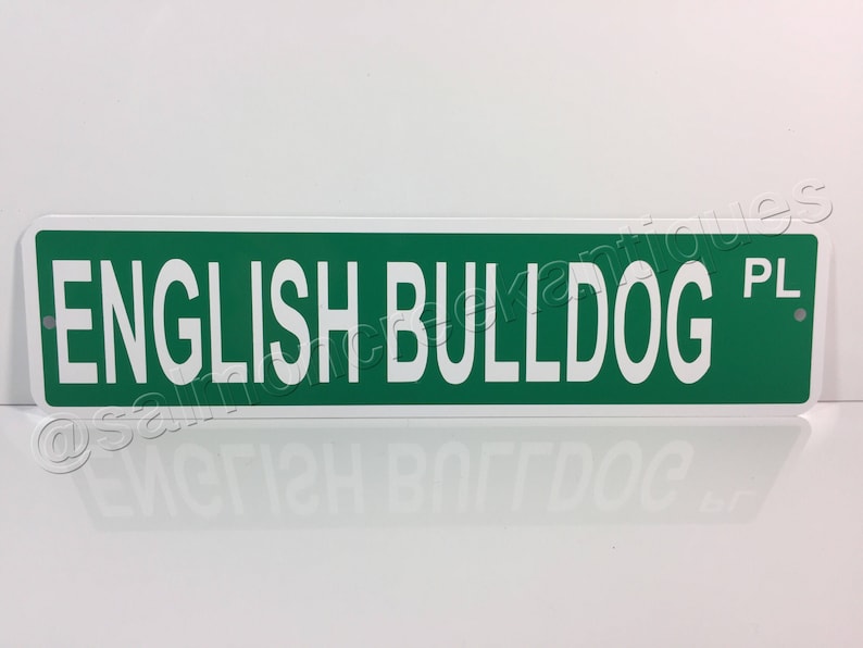 May include: Green and white metal sign with the text "ENGLISH BULLDOG" and the letters "PL" in the top right corner.