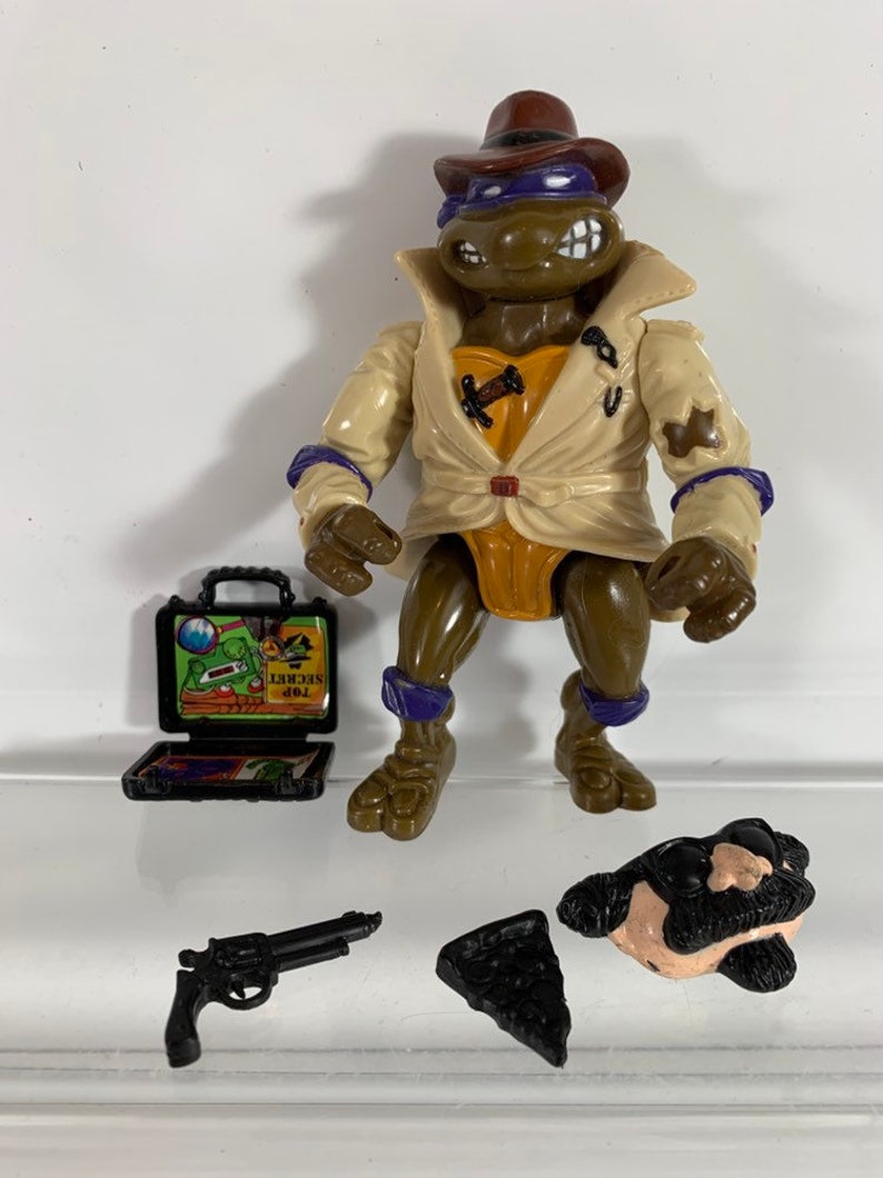 Vintage 1990 Don the undercover turtle agent Donatello TMNT Teenage Mutant Ninja Turtles action figure with mask and weapons