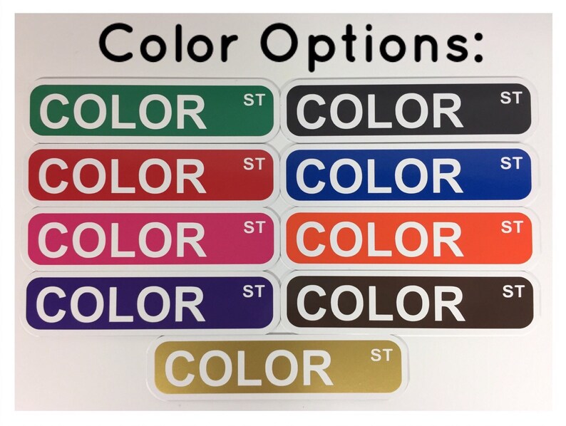 May include: Eight color options for a product, shown as rectangular labels with the word "COLOR" in white text and "ST" in black text. The colors are green, red, pink, purple, black, blue, orange, and brown.