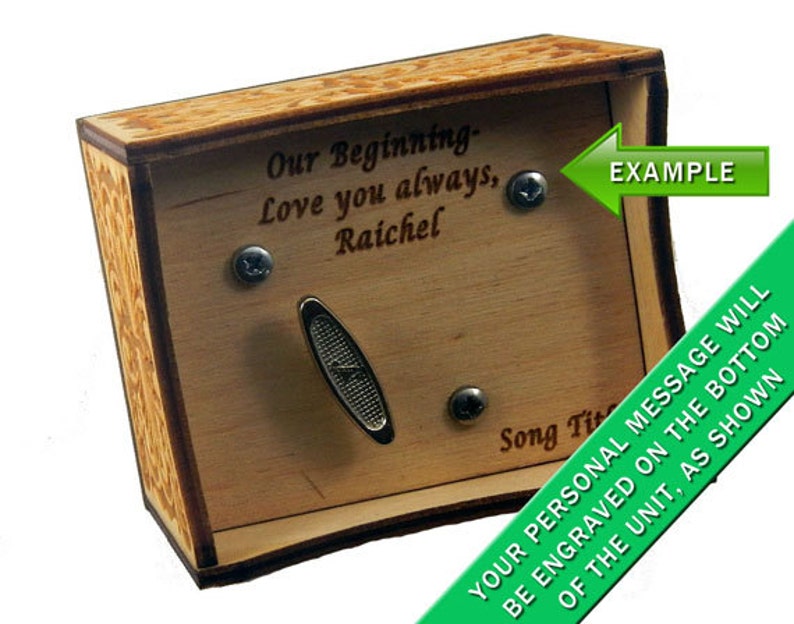 May include: A wooden music box with a slot for a crank and a small metal plate. The box has a personalized message engraved on the top: "Our Beginning- Love you always, Raichel". The bottom of the box has a message that reads: "Your personal message will be engraved on the bottom of the unit, as shown".