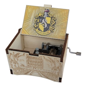 Hogwarts Castle, Hufflepuff Crest, Featuring Music of Hedwig's Theme, Hand Crank Music Box