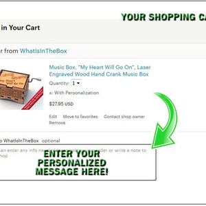 K&ouml;nnte beinhalten: Eine Holz-Musikbox mit einem lasergravierten Design, auf dem "My Heart Will Go On" steht. Die Musikbox ist handgekurbelt und hat einen kleinen Schl&uuml;ssel an der Seite. Die Musikbox kostet 27,95 $ US und ist bei WhatIsInTheBox erh&auml;ltlich.