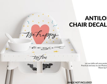 May include: White high chair with a removable tray featuring colorful decals with the text "Be happy", "Be free", and "Begin".