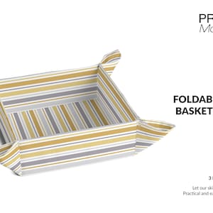 May include: A striped fabric bread basket mockup. The basket is folded into a square shape and is made of a light gray and yellow striped fabric.