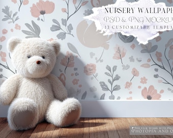 May include: A plush, cream-colored teddy bear sits against a wall decorated with a floral wallpaper design. The wallpaper features pink and gray flowers and leaves on a white background. Text at the top reads "NURSERY WALLPAPERS PSD & PNG MOCKUPS 13 CUSTOMIZABLE TEMPLATES".