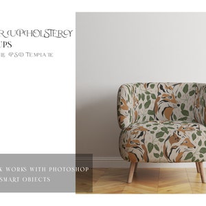 May include: A brown armchair with a cream-colored fabric upholstery featuring a repeating pattern of stylized foxes and green leaves. The chair has a rounded back and wooden legs. The chair is in front of a white wall and a wood floor.