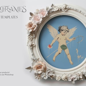 May include: White oval frame with ornate details and floral accents. The frame is decorated with delicate, light pink and white flowers. The frame is empty, but the background is a light blue color.