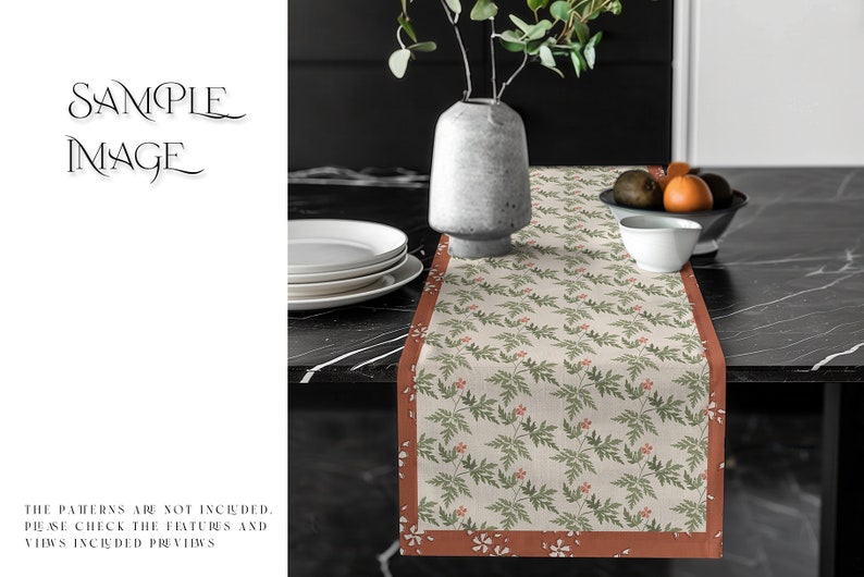May include: A beige table runner with a green and red floral pattern. The runner has a rust-colored border with a white floral pattern. The runner is on a black table with a white plate and a vase with green leaves.