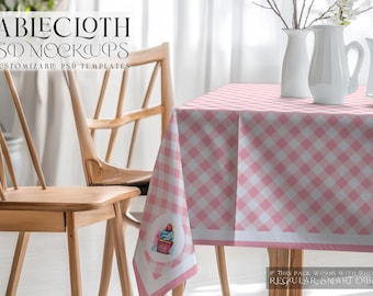 May include: A pink and white checkered tablecloth with a white border. The tablecloth is on a table with two wooden chairs. The tablecloth has a small design of a cupcake in the lower left corner.