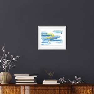 May include: A framed watercolour painting of a yellow sun setting behind blue clouds. The painting is titled "愛" which is Japanese for "love".