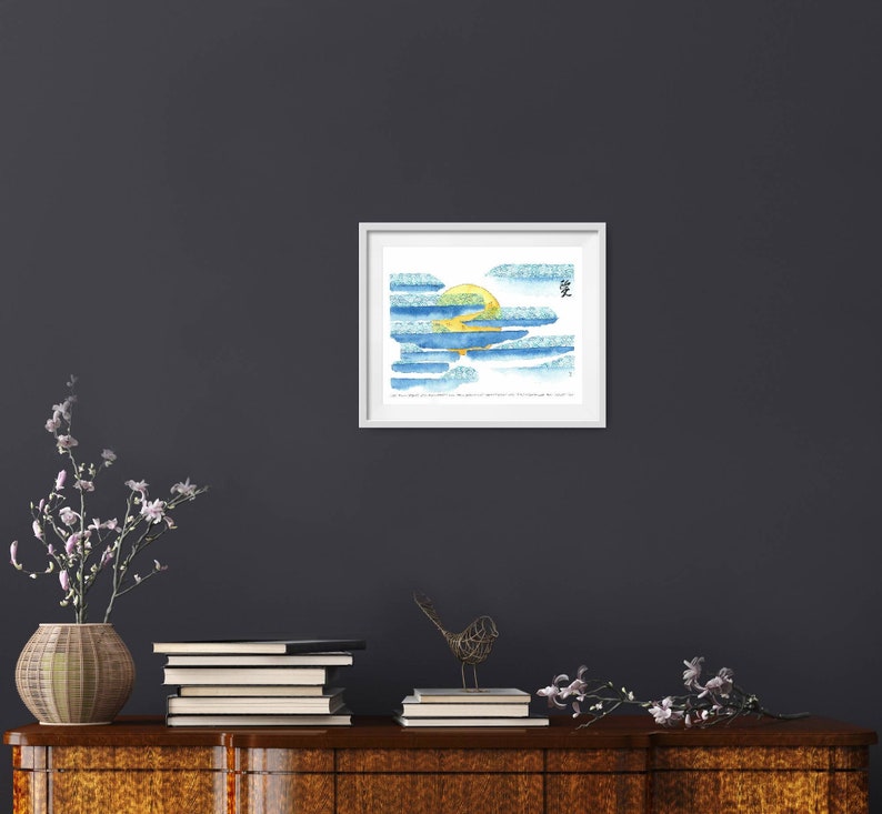 May include: A framed watercolour painting of a yellow sun setting behind blue clouds. The painting is titled "愛" which is Japanese for "love".