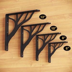 May include: Four black metal shelf brackets in different sizes, 6 inches, 8 inches, 10 inches, and 12 inches. Each bracket features a tree branch design.