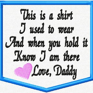 May include: A blue framed pocket with a pink heart and the text "This is a shirt I used to wear And when you hold it Know I am there Love, Daddy".