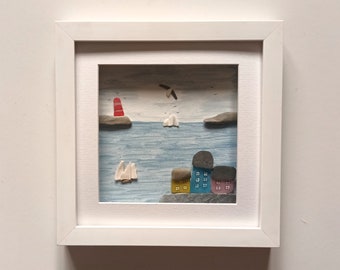 Coastal wall art made from Cornish beachcombed finds, Sea Glass Cottages and Sea Shell Sailing Boats, Made in Cornwall