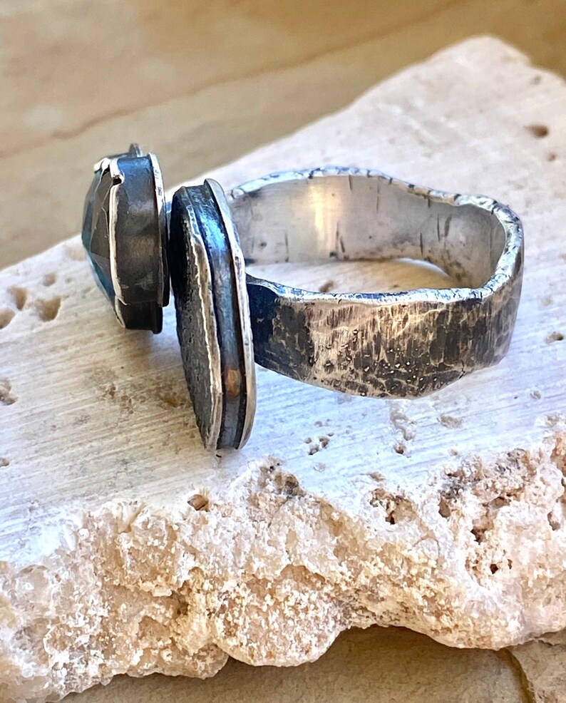 Step Up Sterling Silver Hollow Form and Blue Gems Ring