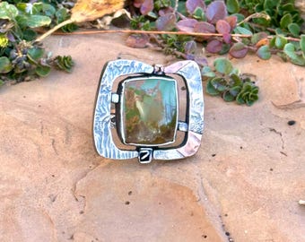 Surround Mixed Metal Hollow Form and Rising Phoenix Turquoise Ring