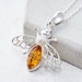 see more listings in the Amber Pendants section