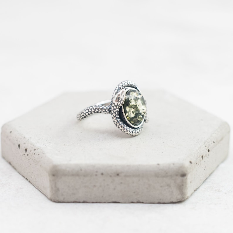 All our rings are made with attention to details with hand-picked sparkling green amber stones
